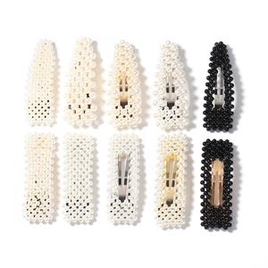 10-piece set of woven pearl hair clips in white and black teardrop and rectangular shapes