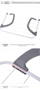 Detail view of the folding grey hooks and adjustable white metal rack for easy balcony storage