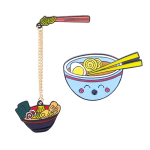 Cartoon ramen noodle enamel pin set featuring cute bowl and chopsticks with chain