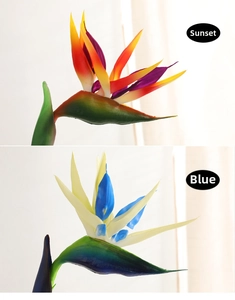 Detailed macro view of artificial Strelitzia flowers in sunset orange and blue colorways