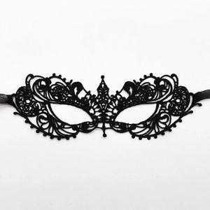 Elegant black lace masquerade mask with intricate embroidery and silk ribbons