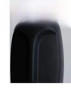 Close-up of matte black ceramic vase featuring minimalist U-shaped groove design and texture