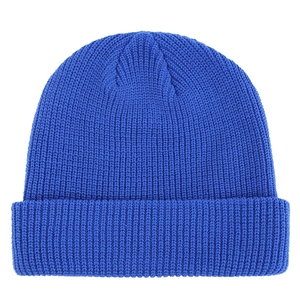 Detail of bright blue ribbed knit beanie showing high-quality textured weaving finish
