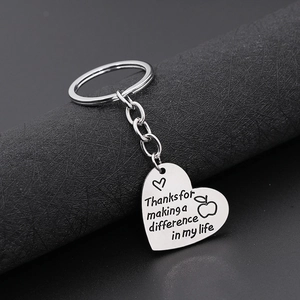 Silver heart keychain with engraved Thanks for making a difference in my life quote