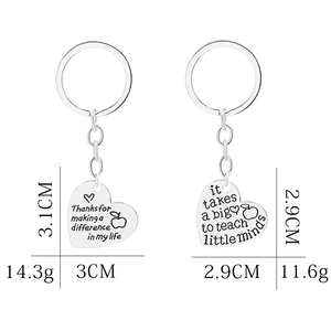 Polished heart keychains for teachers with Big Little Minds engraving and dimensions