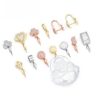 Macro view of crystal-encrusted jewelry bails in various shapes and metal finishes