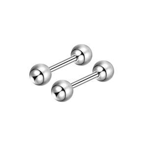 Close-up of a pair of silver stainless steel labret piercings with zircon stones