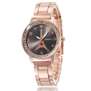 Montre femme élégante en or rose avec lunette en strass et motif de la Tour Eiffel