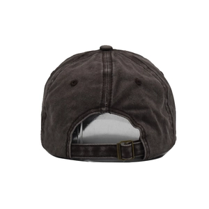 Detail of adjustable metal buckle and washed cotton texture on a grey baseball cap