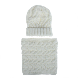 Vertical flat lay of off-white cable knit hat and matching thick winter neck warmer set
