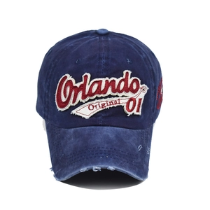 Vintage navy blue washed denim baseball cap with Orlando 01 embroidery and distressed detail