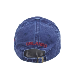 Detailed back view of navy denim baseball cap with red Orlando embroidery and metal buckle