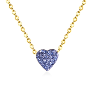 Elegant gold chain necklace featuring a blue crystal heart pendant on white background