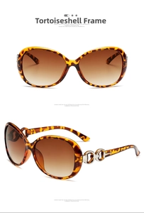 Detail of oversized leopard print sunglasses with gradient lenses and silver metal link accents