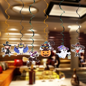 Close-up of Halloween hanging swirls featuring cartoon witch, bat, ghost and skeleton motifs