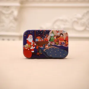 Detailed view of rectangular Christmas tin boxes featuring Santa and reindeer illustrations