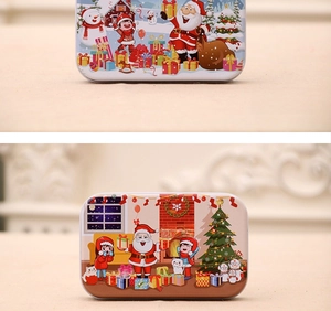 Christmas rectangular tin boxes featuring festive Santa Claus and snowman illustrations
