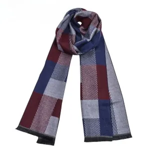 Detailed close-up of classic red and blue checkered scarf with soft fringed edges