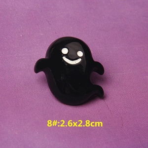 Detailed view of black ghost resin accessory with white face for DIY crafts, 2.6x2.8cm