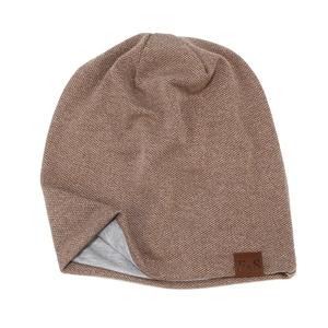 Brown knit beanie with soft grey lining and leather patch for men and women in winter