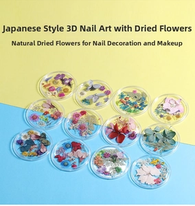 Detail of 12-grid set with natural dried flowers for nail art in various vibrant colors