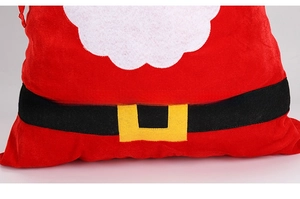 Detail view of red velvet Christmas gift bag with Santa Claus belt design and buckle
