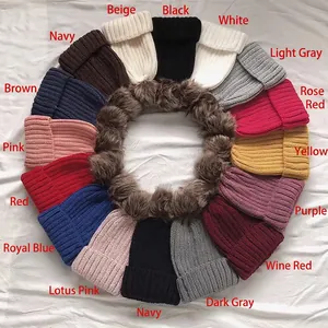 Winter knitted hats for women with faux fur pom-poms shown in 15 different colors