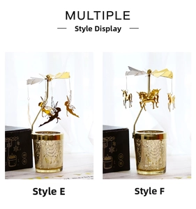 Detail showing golden rotary spinning candle holders with angel and unicorn charms