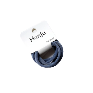 Set of six chic blue-grey elastic hair bands on a white minimalist display card