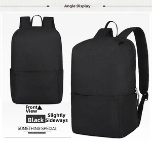 Detailed close-up of a black durable nylon casual backpack with large front zipper pocket
