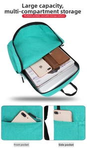 Detailed interior of blue leisure backpack showing storage for laptop, magazines and pockets