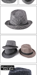Close-up of mixed dark blue tweed fedora hat with elegant black decorative ribbon band