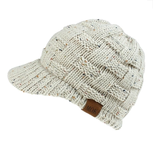 Detailed close-up of beige knit ponytail baseball cap with a brown MOK leather label