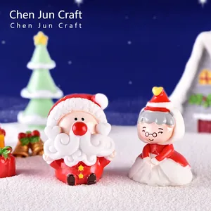Miniature resin Santa and Mrs. Claus figurines for festive Christmas landscape decor