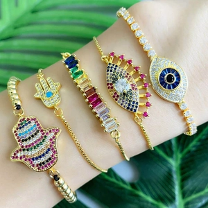 Bracelet ajustable Main de Fatma et Œil de Protection avec zircons colorés dorés à l'or