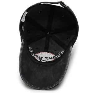 Black washed cotton baseball cap with adjustable metal buckle and New York embroidery