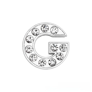 Detailed view of silver-tone letter G slider bead with sparkling white crystals for DIY bracelets