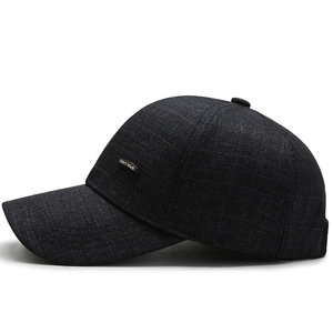 Classic dark black plaid newsboy cap for elderly men with a side metal brand logo