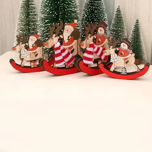 Detail of wooden rocking reindeer figurine with Santa Claus and a striped fabric scarf