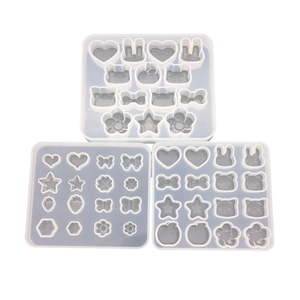 DIY silicone molds set for resin pendants featuring rabbit, star, and flower shapes