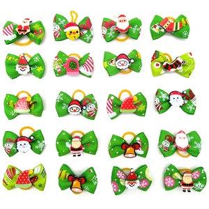 20pcs Christmas pet hair bows set with festive green ribbons and holiday patterns