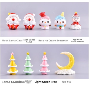 Detailed collection of nine resin Christmas miniatures including Santa and snowmen figurines