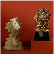 Detailed comparison of lion head sculptures in beige sandstone and golden metallic finish