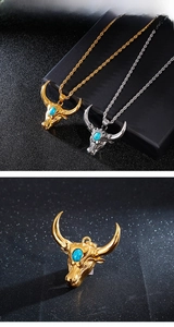 Macro detail of vintage bull head pendant with turquoise stone inlay on a rope chain