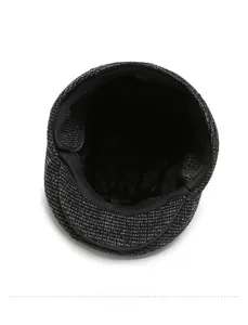 Close-up of the warm thickened fleece lining inside the winter flat cap for men