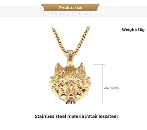 Detailed view of a 46x37mm gold wolf head pendant on a stainless steel box chain