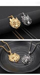 Detailed relief of punk style wolf head pendants in gold and silver steel finish