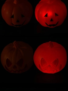 Detailed comparison of large Halloween pumpkin lanterns showing lit and unlit modes