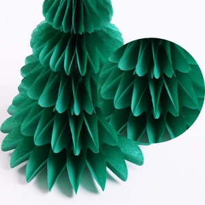 Detailed close-up of green honeycomb paper Christmas tree decoration showing texture