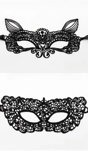 Detail of black lace masquerade masks in cat ear and classic flat top floral designs